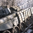Украинский танк Т-64 пытался вырваться из котла по какой-то региональной трассе, и рухнул в реку вместе с мостом Фото: скриншот видео - Комсомольская правда