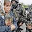 В 2014 году мирное население Донбасса пыталось остановить украинские войска словом. Сегодня мало кто решается открыто высказывать свое отношение к ВСУ. Фото: AFP/EAST NEWS - Комсомольская правда