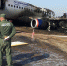 Сотрудники СК на месте пожара самолета "Сухой Суперджет", 6 мая 2019 г. - Комсомольская правда