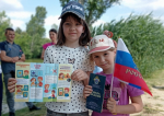 В День России сотрудники Следственного комитета развернули тридцатиметровый флаг страны в Симферополе (ФОТО, ВИДЕО)