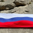 Крымские спасатели водрузили российский флаг на отвесной стене Судакской крепости - Вести Крым